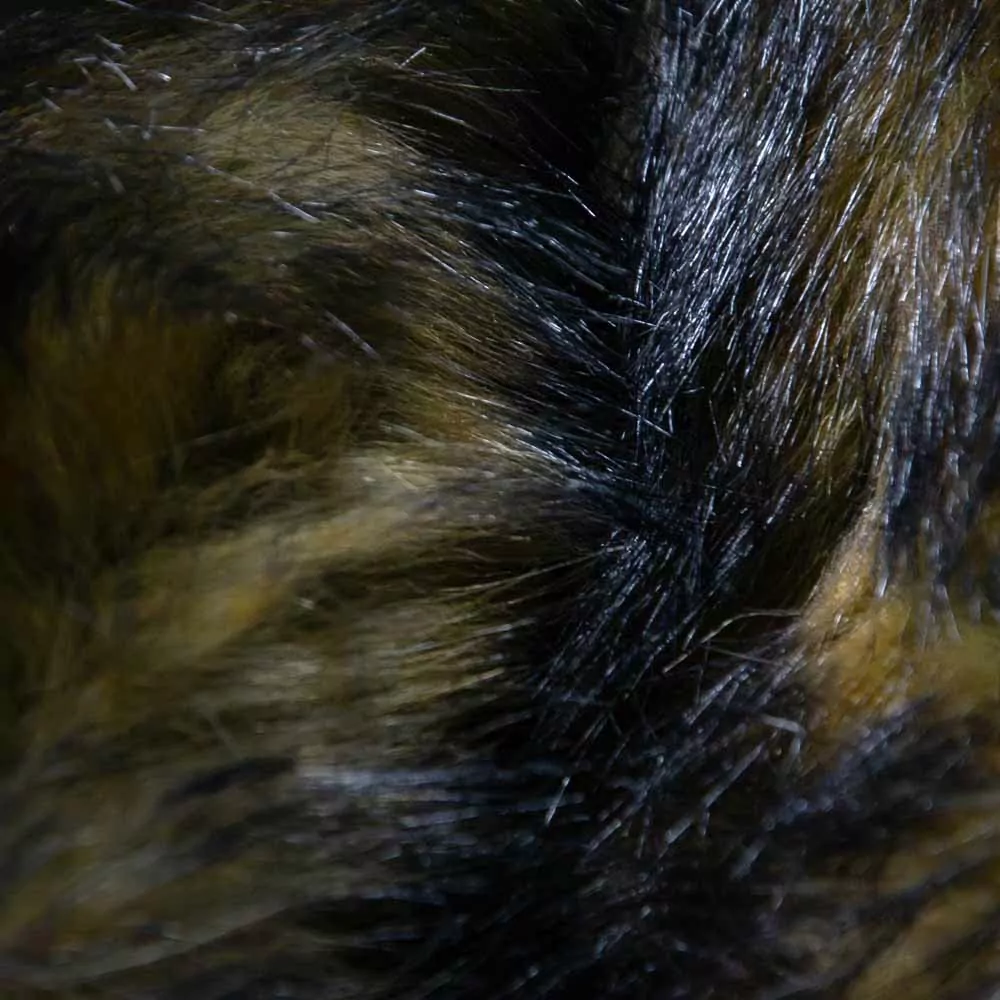 Хутро єнота "V" # рыже-черний зображення